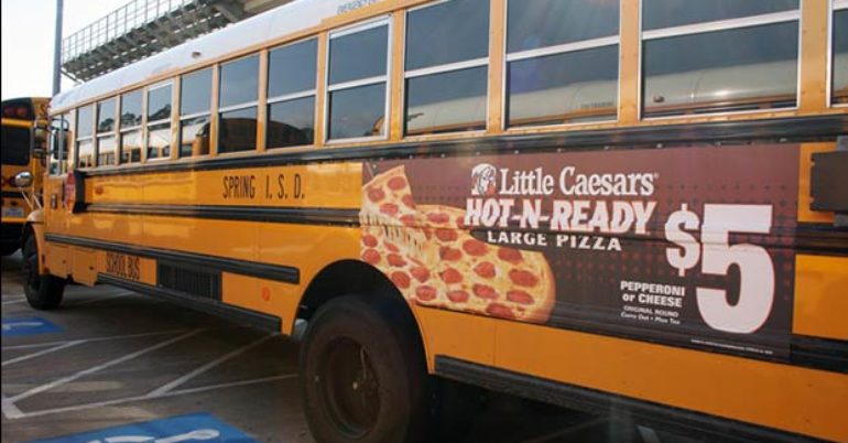 School bus advertising helps solve school district budget concerns